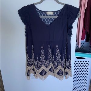 Navy embroidered top with see through back